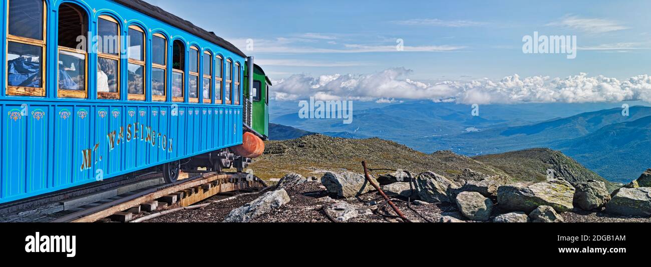 Train on railroad tracks, Mount Washington Cog Railway, Mt Washington, New Hampshire, USA Stock Photo