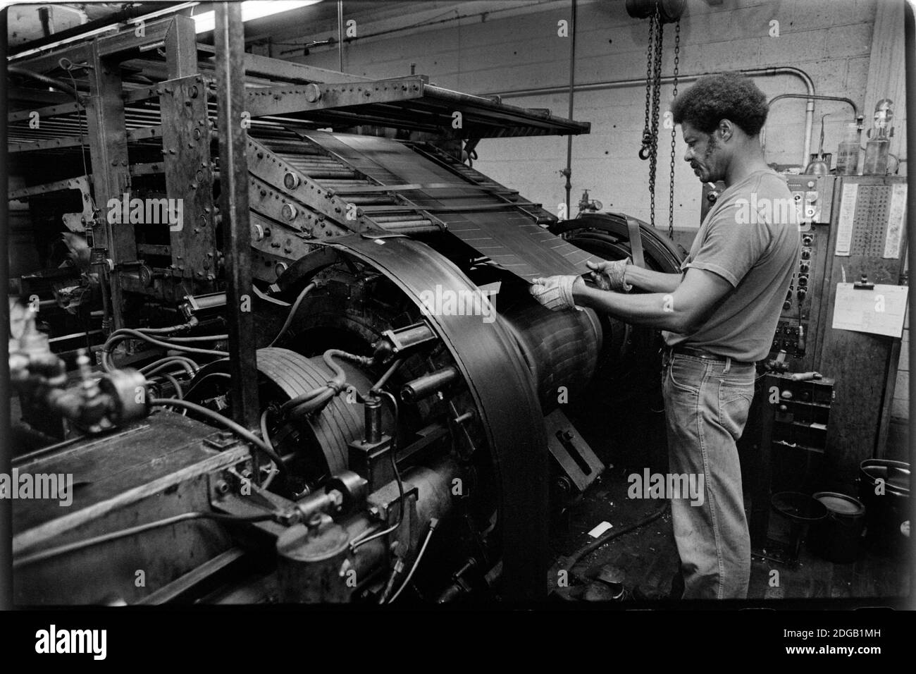 Workers at the General Tire Company in Akron, Ohio, work the final production shift for making passengers tires before the factory closed for good on August 20, 1982. More than 800 production workers lost their jobs. General Tire had been the last company to make tires in northeast Ohio city, after Goodyear, B.F. Goodrich and Firestone made cuts. Akron had been known as the Rubber Capital of the World. Ernie Mastroianni photo. Stock Photo