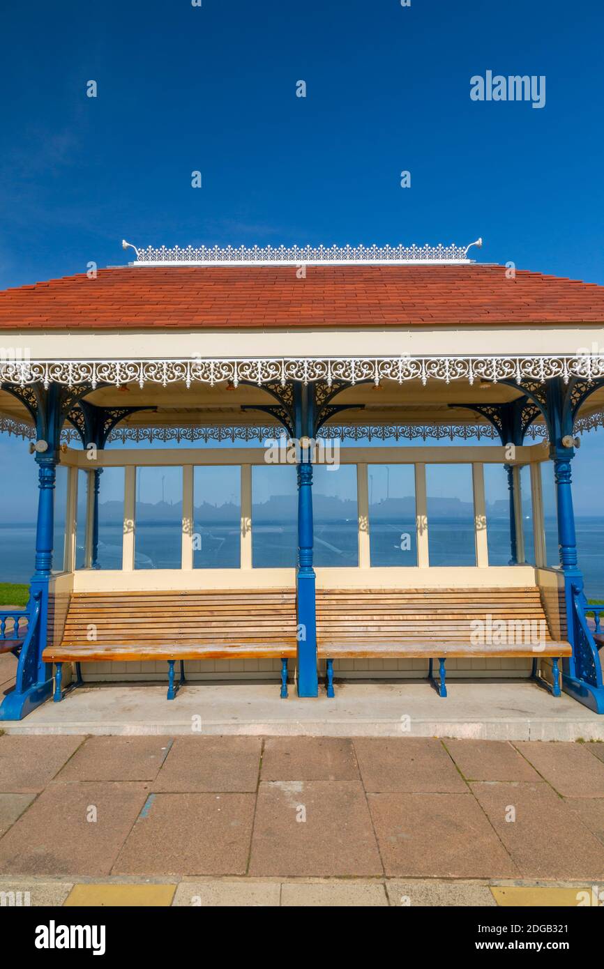 View of traditional shelter on West Cliff Beach, Whitby, North