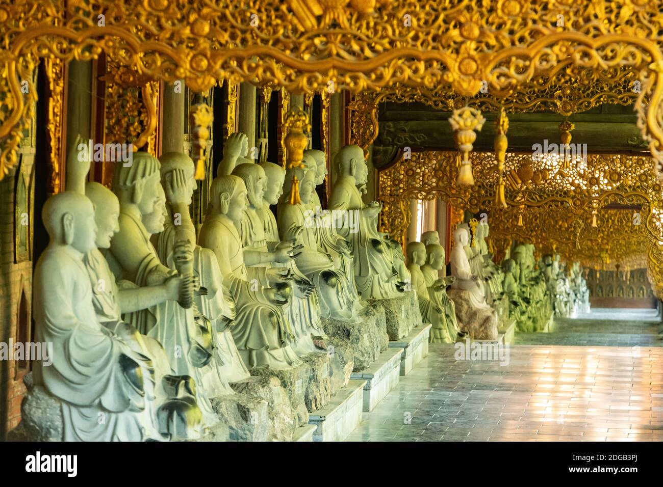 statues of Buddha in different poses, in Bai Dinh temple complex, in Ninh Binh province, Vietnam Stock Photo