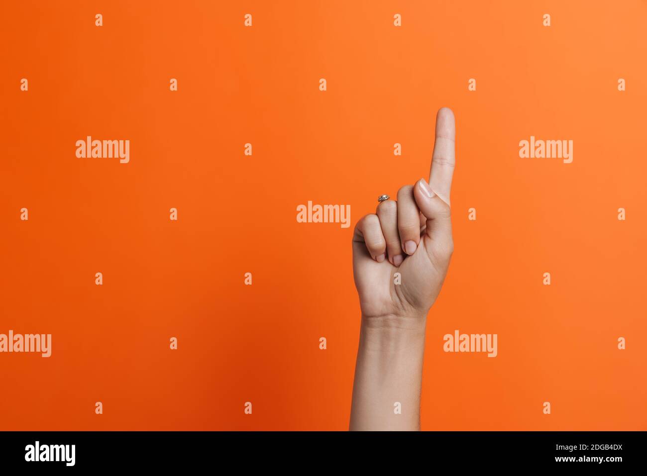 Woman's hand pointing away isolated Stock Photo - Alamy