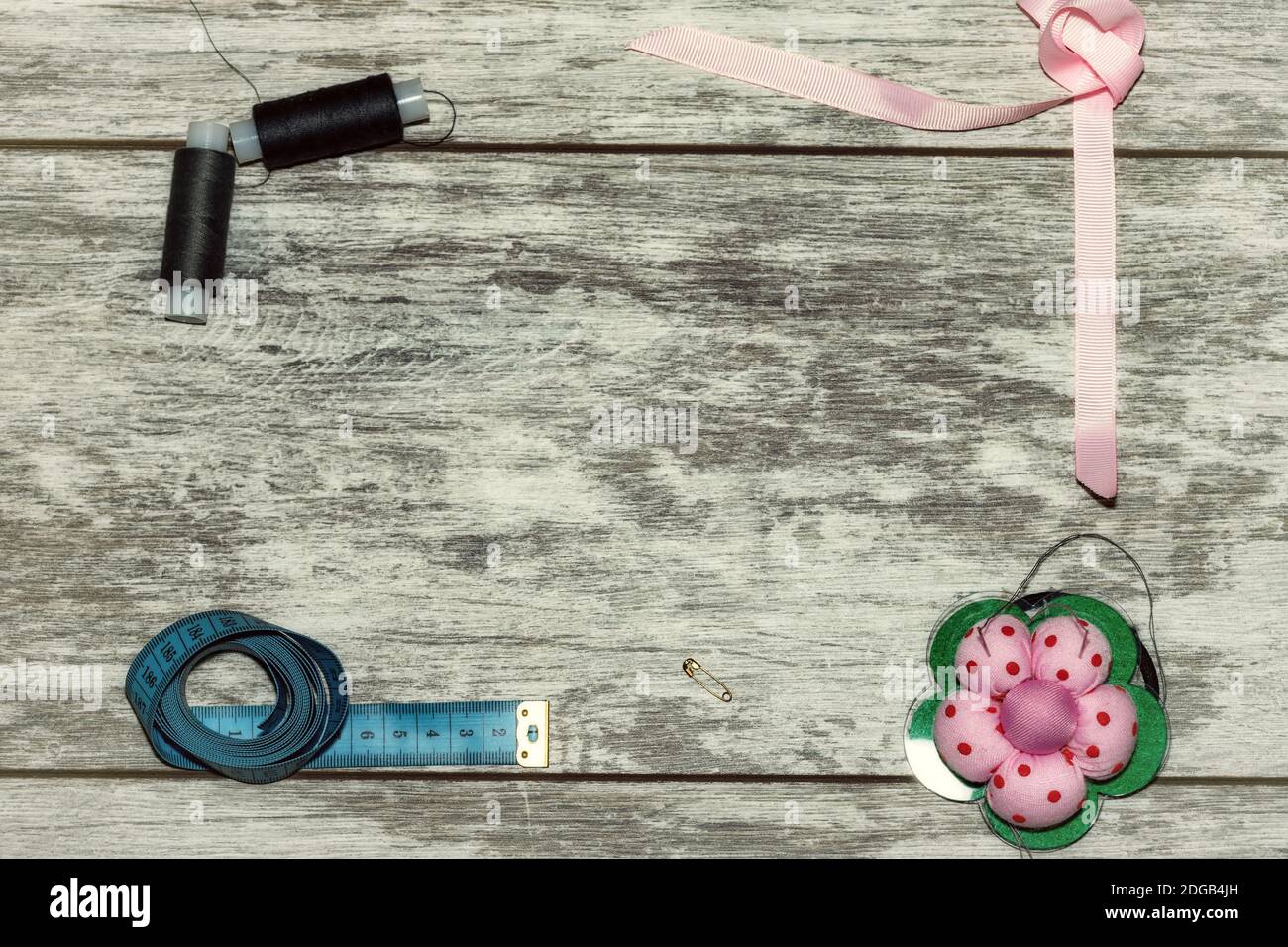 Buttons, ribbon , thread and needles for sewing Stock Photo