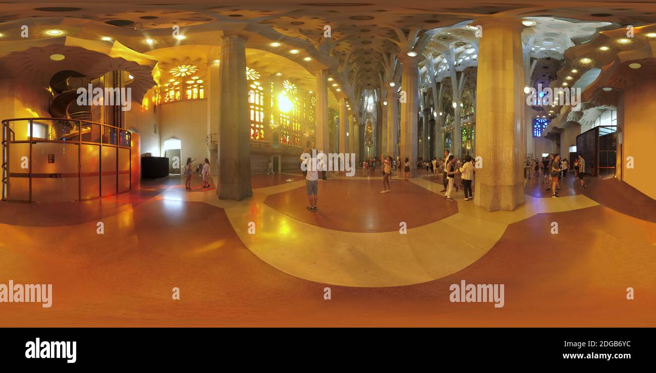360 VR Visitors enjoying unique architecture inside Sagrada Familia, Barcelona Stock Photo