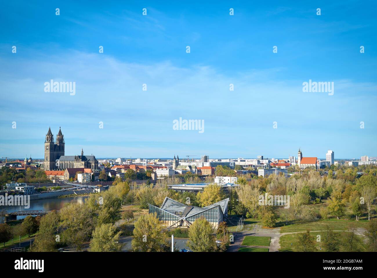 Panorama of the city of Magdeburg with the Rotehornpark and the Magdeburg Cathedral on the other side of the Elbe River Stock Photo