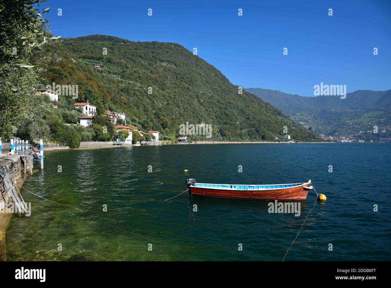A boat in Lake Iseo. Monte Isola, Brescia, Lombardy, Italy. Stock Photo