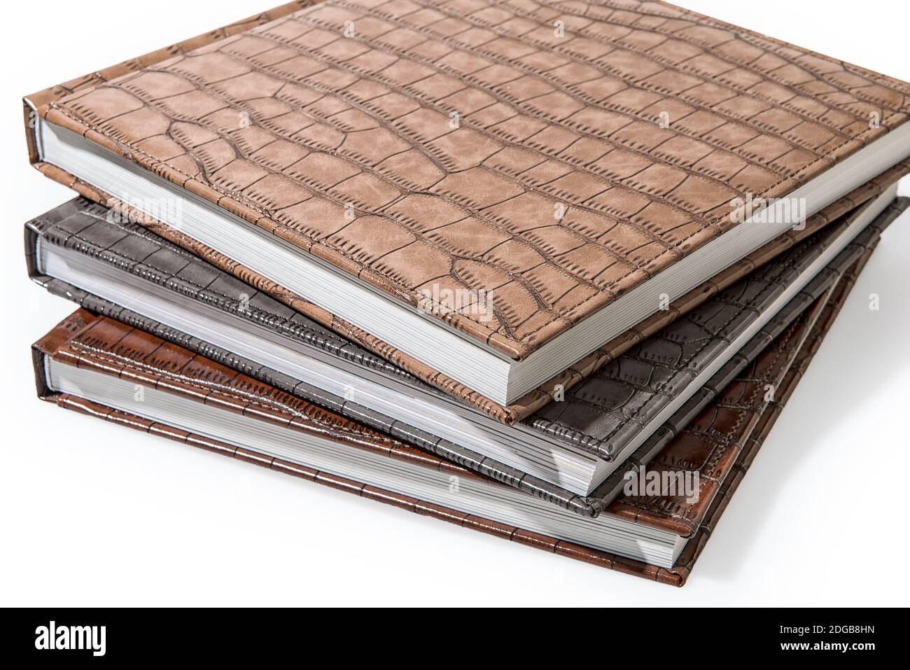Hardcover books lying on a white background Stock Photo