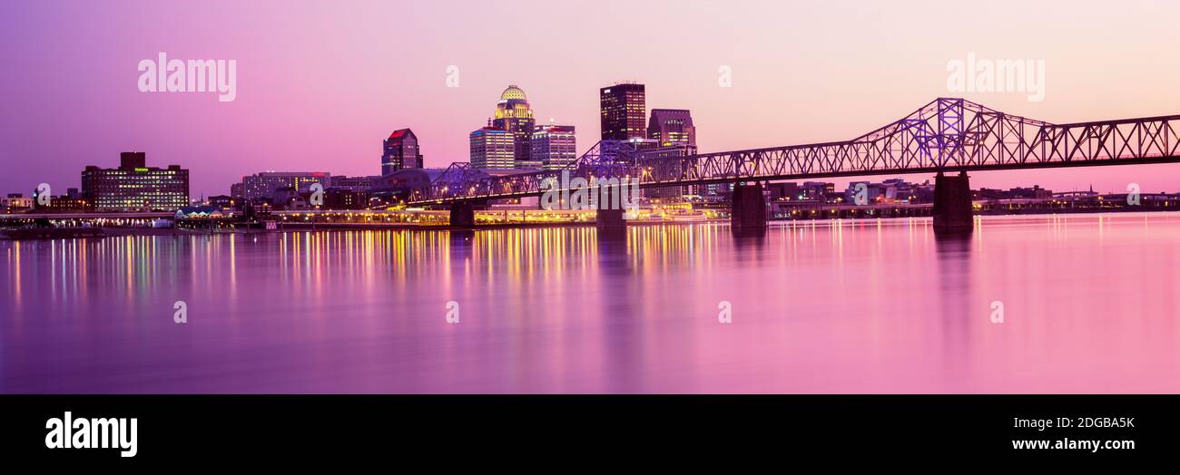 Bridge across a river at dusk, George Rogers Clark Memorial Bridge, Ohio River, Louisville, Kentucky, USA Stock Photo