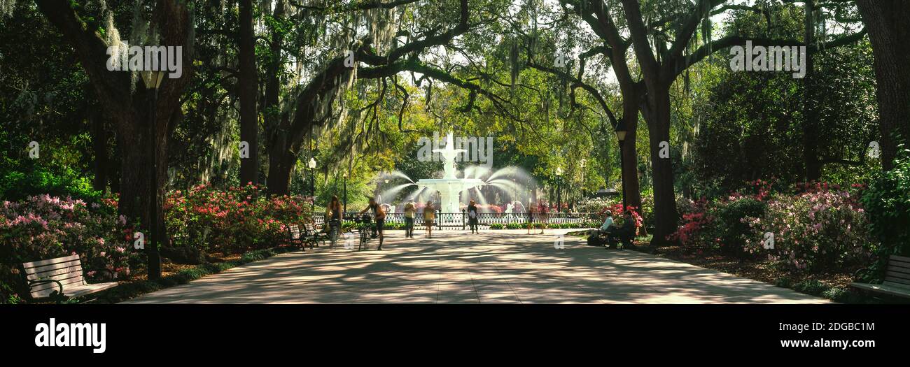 Fountain and tourists in a park, Forsyth Park, Savannah, Georgia, USA Stock Photo