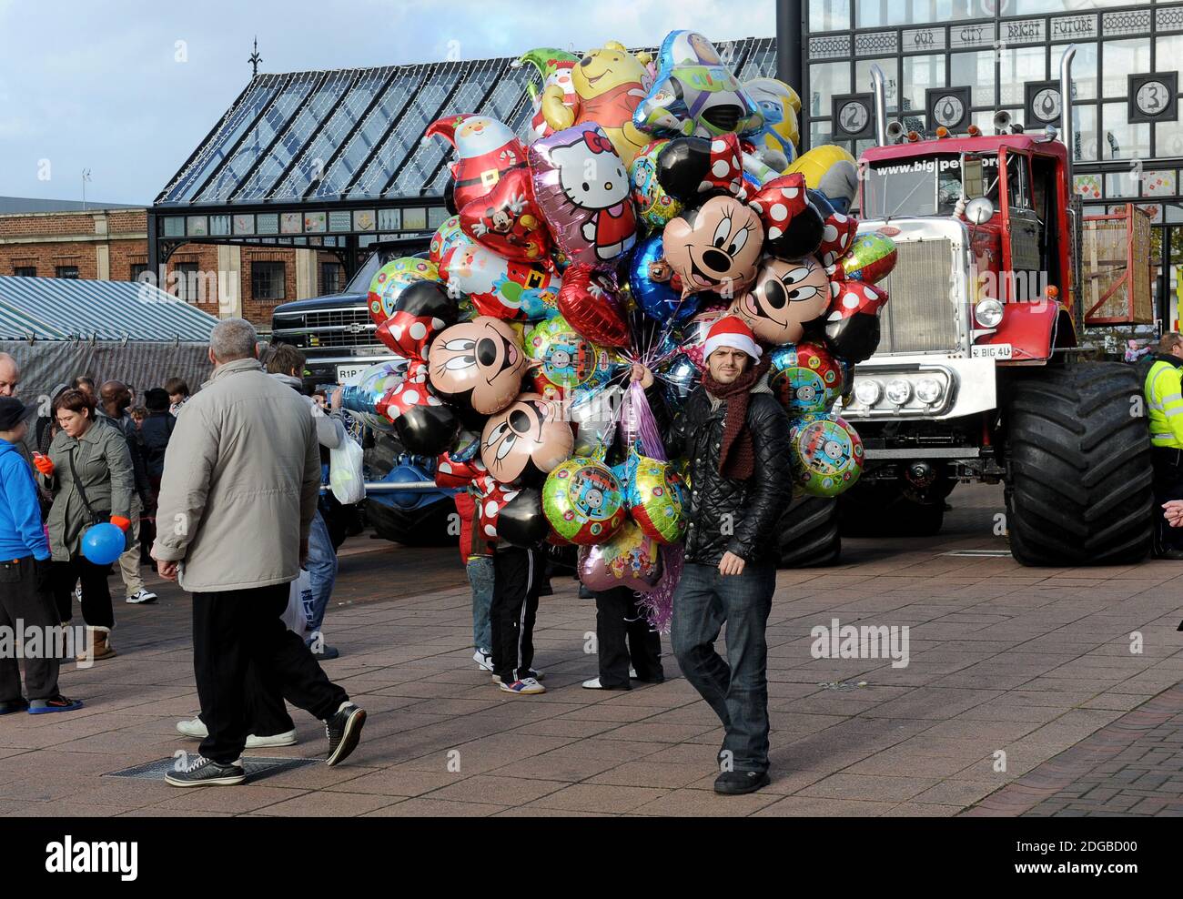 Man selling balloons on the streets of Wolverhampton, Britain, Uk 2011