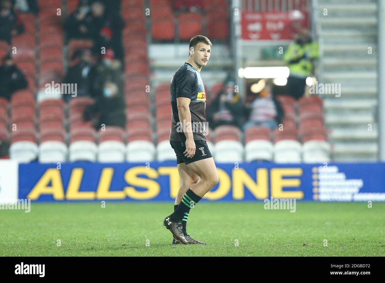 Andre Esterhuizen #12 of Harlequins walks off after receiving a red