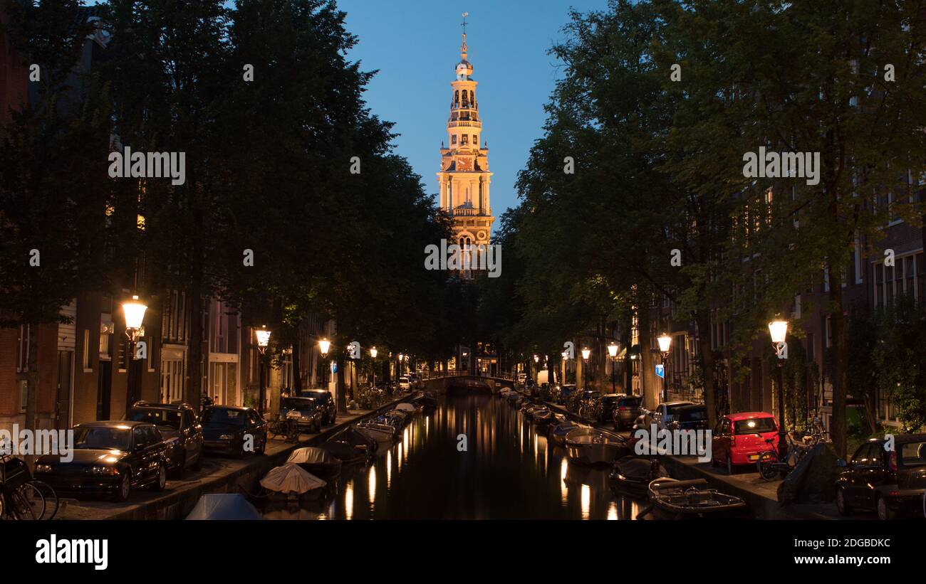 Night view of Amsterdam with canal and Zuiderkerk, Netherlands Stock Photo