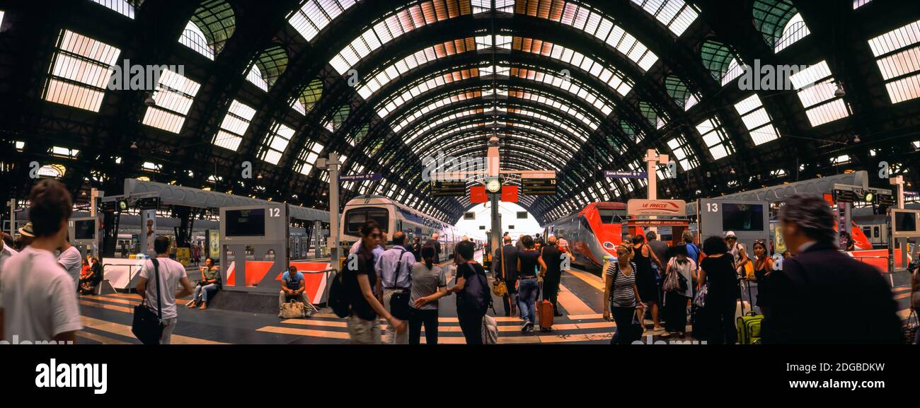 Passengers at a railway station, Milan Central Railway Station, Milan, Lombardy, Italy Stock Photo