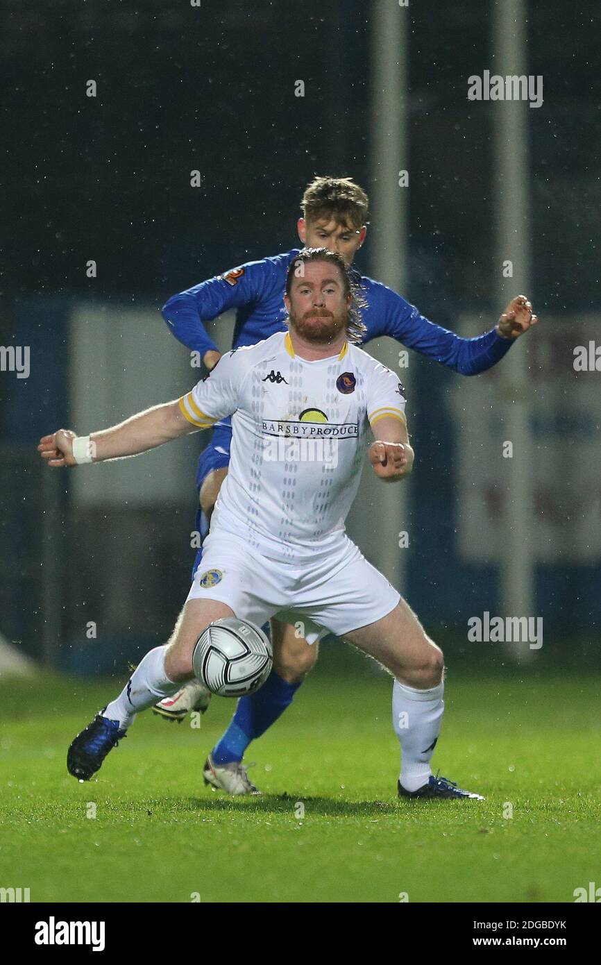 Hartepool, County Durham, UK. 27th Oct 2020. Lewis Cass of Hartlepool United  in action with Altrincham's Yusifu Ceesay during the Vanarama National  League match between Hartlepool United and Altrincham at Victoria Park