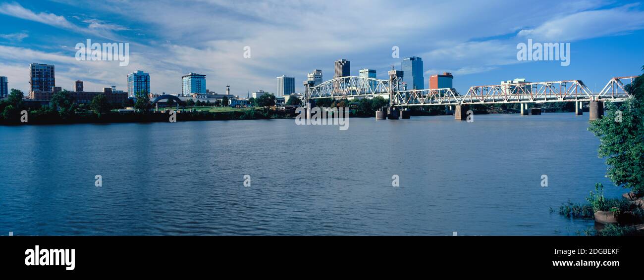 Junction Bridge over Arkansas River with skyscrapers in the background, Little Rock, Arkansas, USA Stock Photo