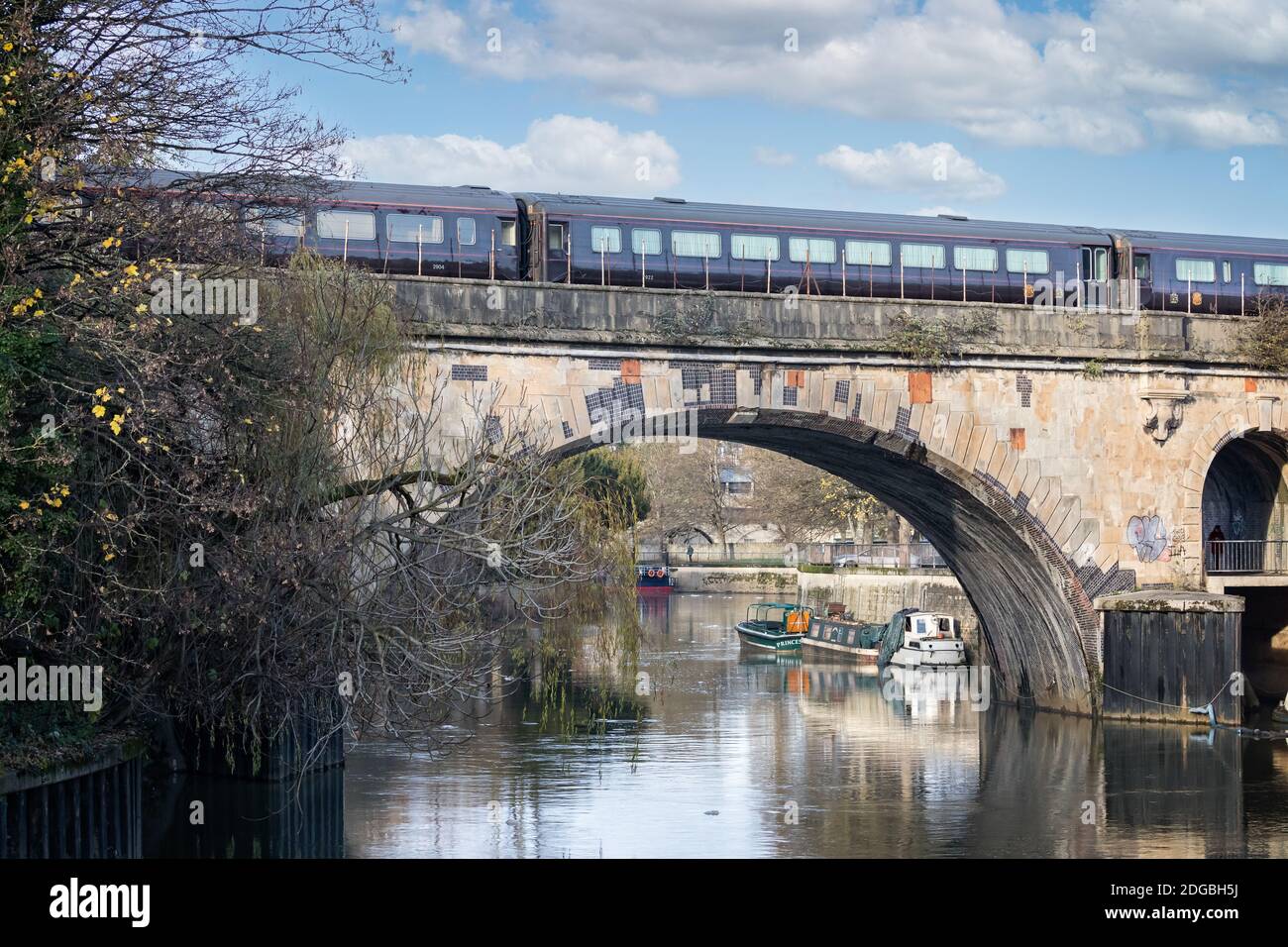 Royal Soverign Train carriages crossing bridge outside Bath Station