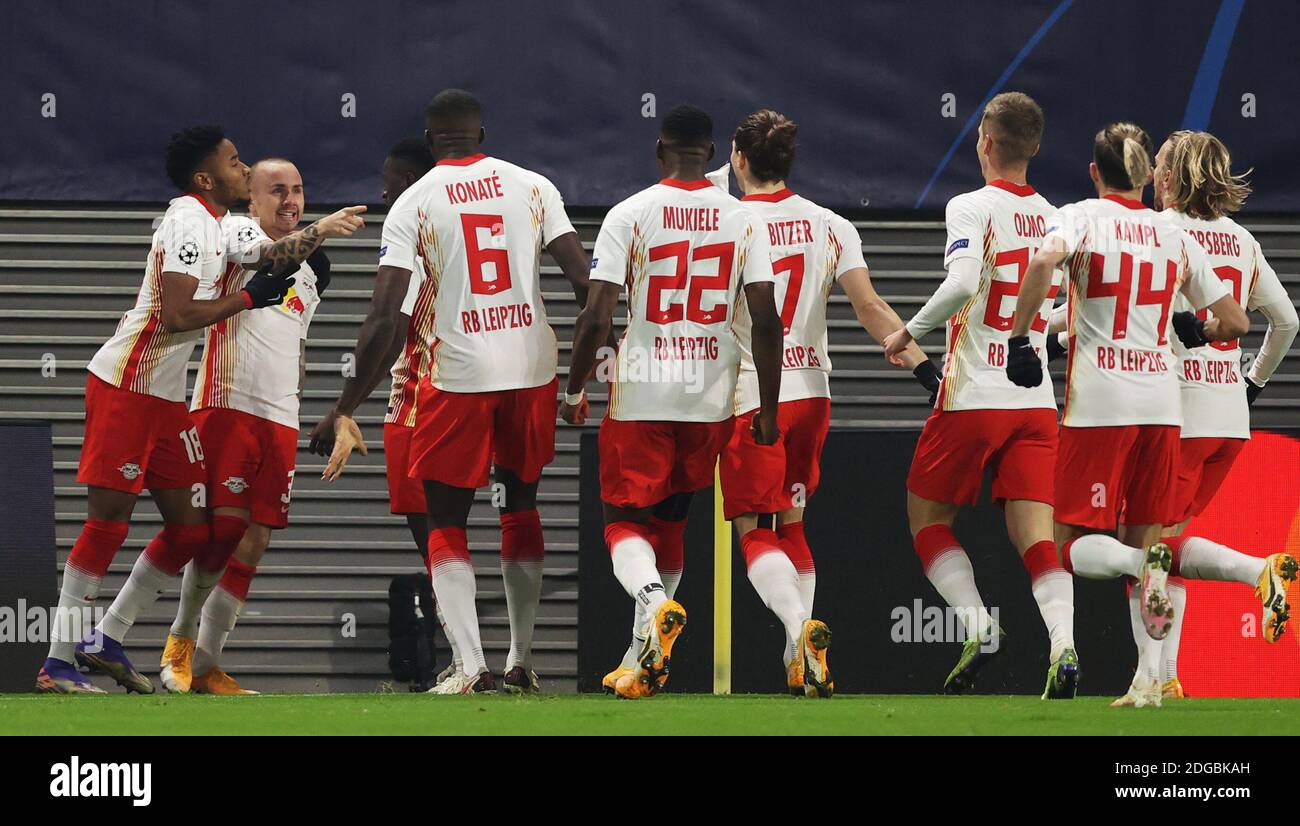 Leipzig, Germany. 08th Dec, 2020. Football: Champions League, group stage,  group H, 6th matchday RB Leipzig - Manchester United in the Red Bull Arena.  Leipzig's Angelino (2nd from left) cheers with his