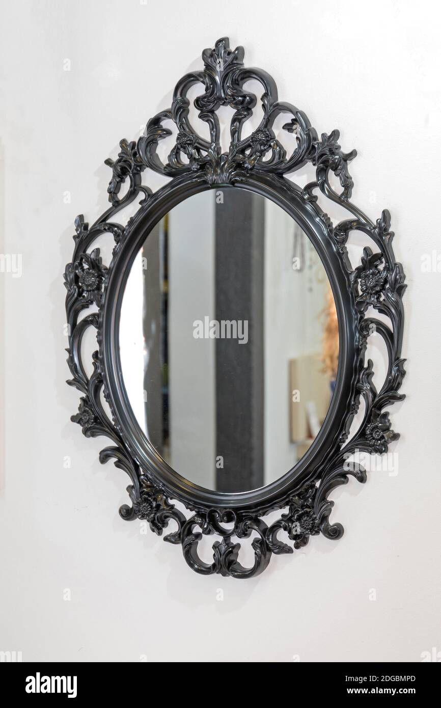 Rustic Style Black Mirror Frame at Wall Stock Photo Alamy