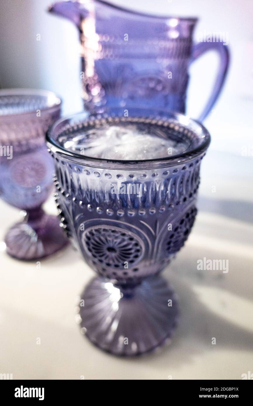 Amethyst colored glassware still life, USA Stock Photo