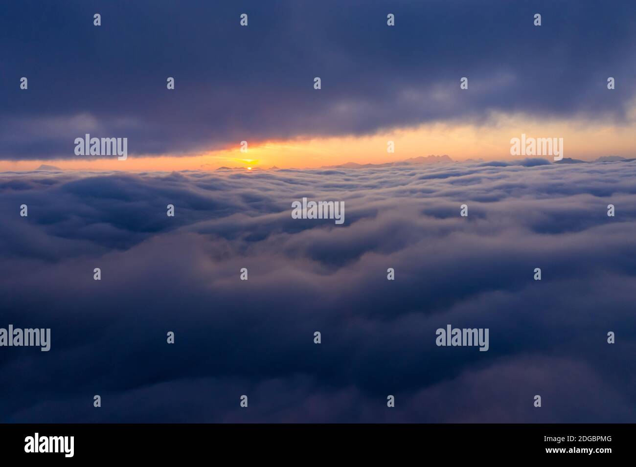 Sunrise above a cloud carpet, Salzburg, Austria Stock Photo