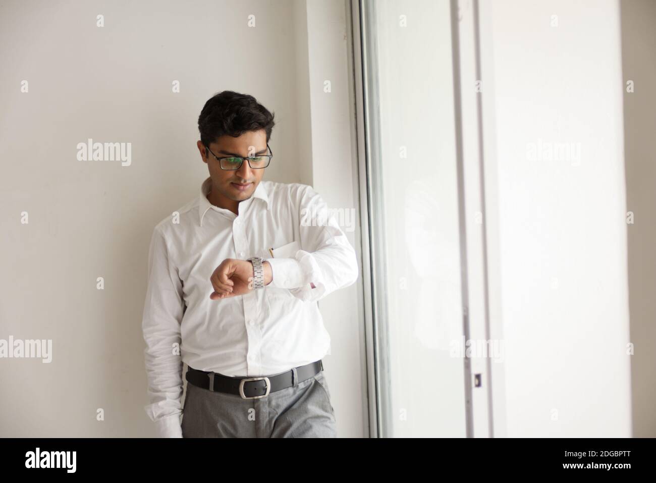 Portrait of Indian Bengali tall, dark, handsome young man in