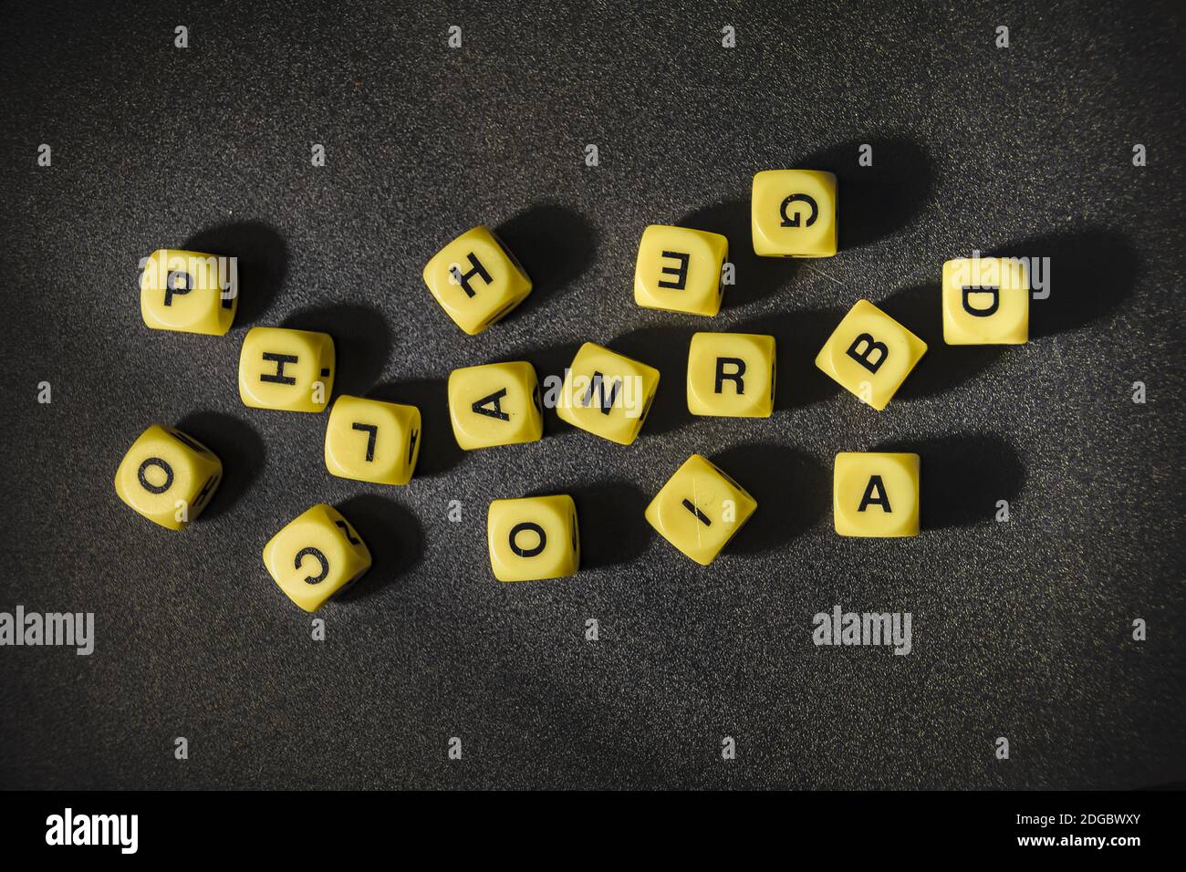 Letters Game Cubes over Black Background Stock Photo