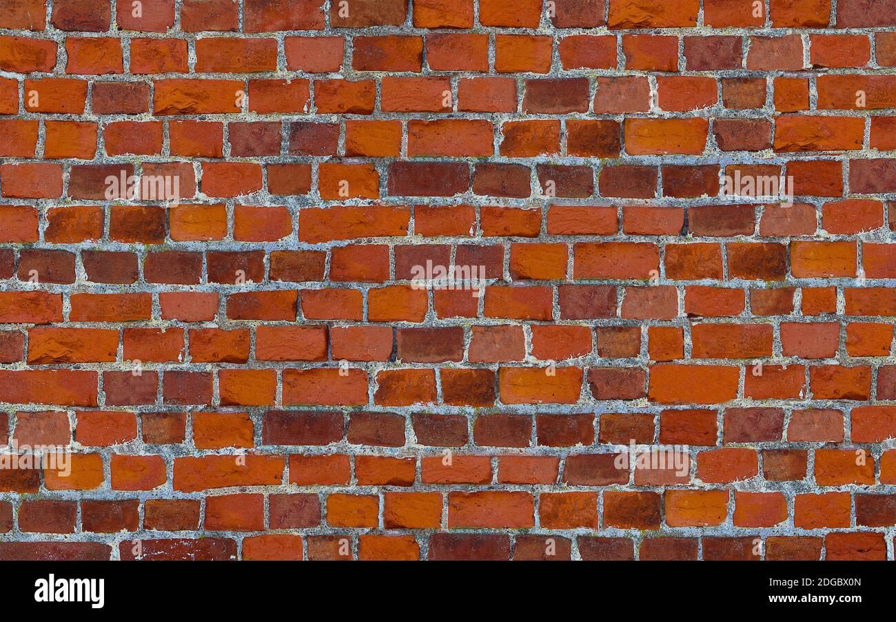 Masonry bricks with cement uneven stripes red background wallpaper Stock Photo