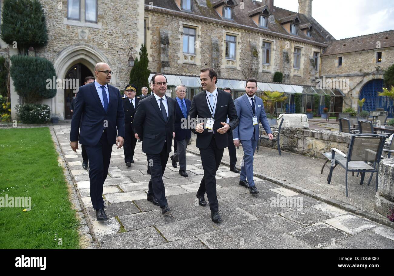 Jean-Jaures Foundation director-general Gilles Finchelstein, Jean-Jaures Foundation president Henri Nallet, French President Francois Hollande, French Secretary of State for European Affairs Harlem Desir during the 3rd session of the Initiative 'Think Tanks Tandem - Together for Europe' focused on the economic and monetary policy of the European Union and hosted by the Jean-Jaures Foundation at Abbaye des Vaux-de-Cernay, in Cernay-la-Ville, near Paris, France on March 31, 2017. Photo by Christian Liewig/ABACAPRESS.COM Stock Photo