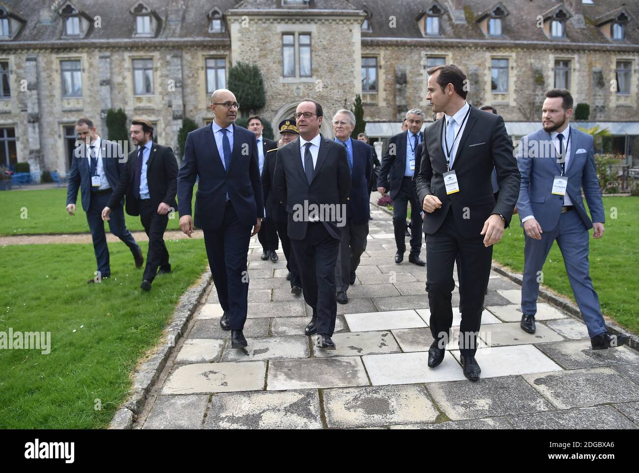 Jean-Jaures Foundation director-general Gilles Finchelstein, Jean-Jaures Foundation president Henri Nallet, French President Francois Hollande, French Secretary of State for European Affairs Harlem Desir during the 3rd session of the Initiative 'Think Tanks Tandem - Together for Europe' focused on the economic and monetary policy of the European Union and hosted by the Jean-Jaures Foundation at Abbaye des Vaux-de-Cernay, in Cernay-la-Ville, near Paris, France on March 31, 2017. Photo by Christian Liewig/ABACAPRESS.COM Stock Photo