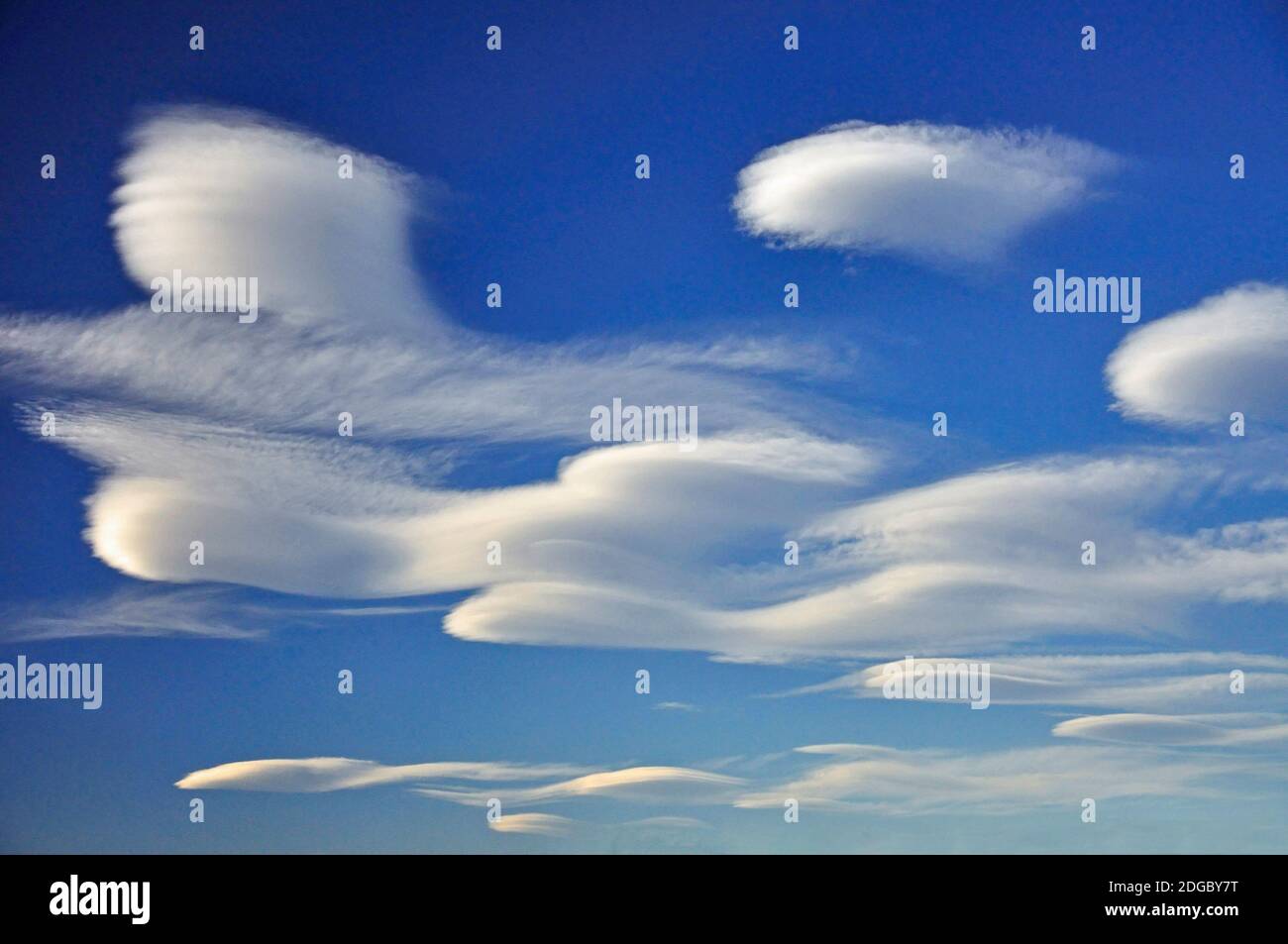 Altocumulus Lenticularis cloud formations, near Southern Alps, Canterbury Region, South Island, New Zealand Stock Photo