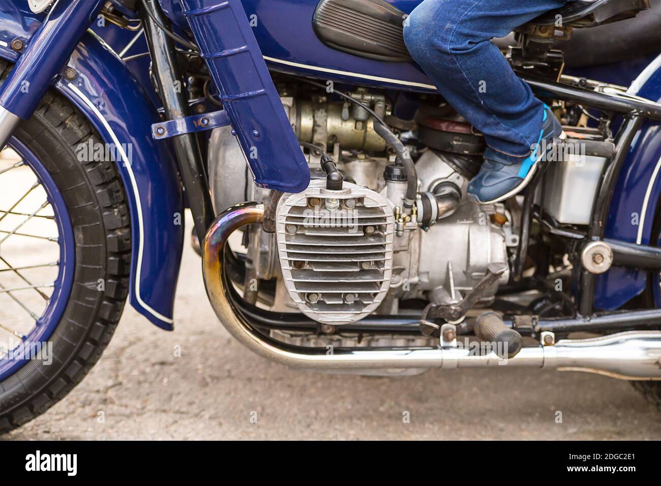 Detail of the old blue motorcycle radiator chrome elements close-up ...
