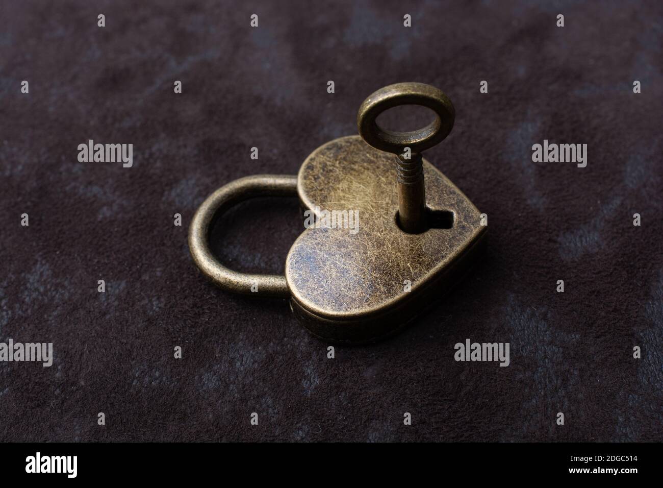 Metal padlock in heart shape as symbol of love Stock Photo - Alamy
