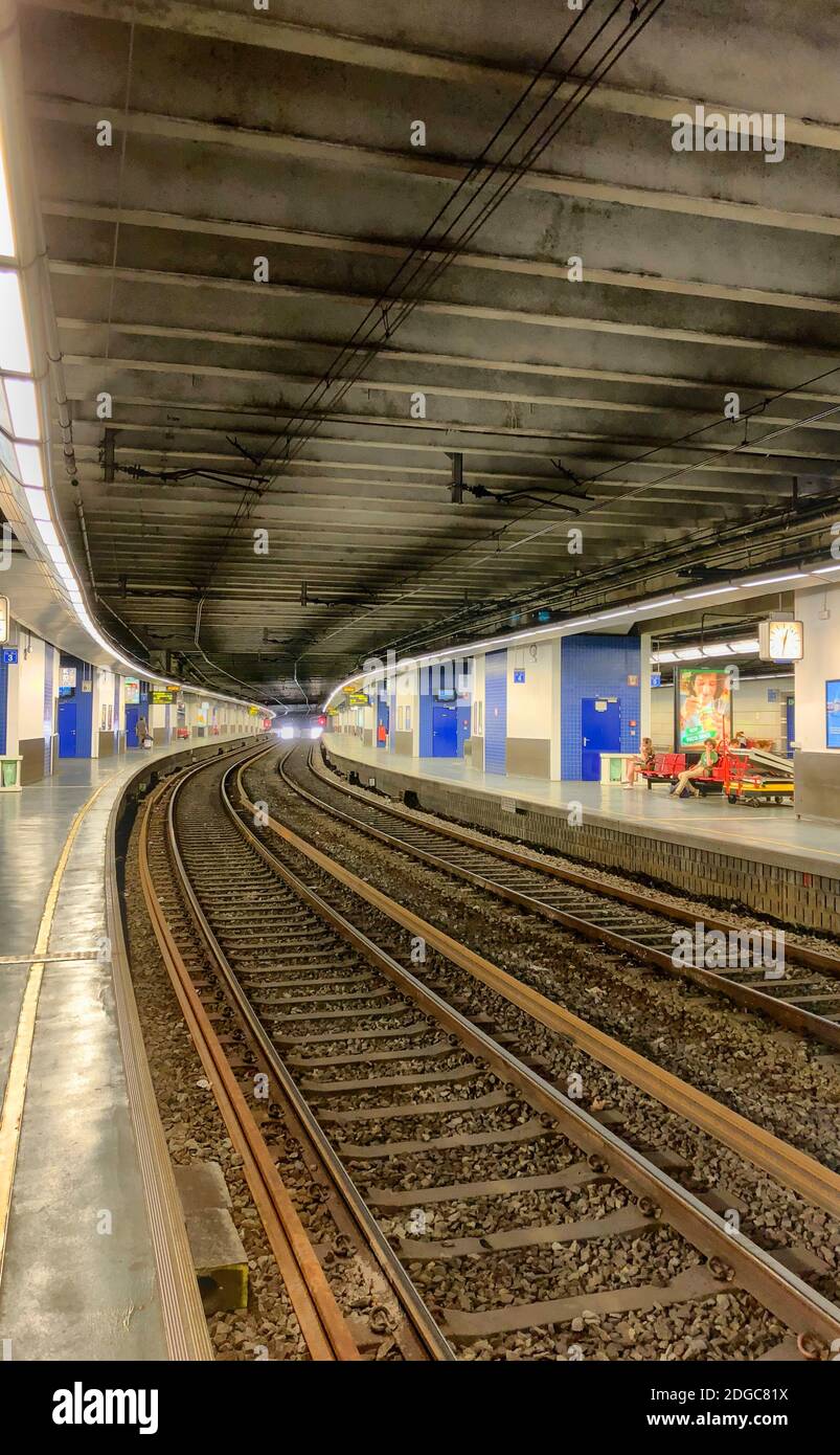 Empty railroad and platform of the Brussels-Luxembourg railway station Stock Photo