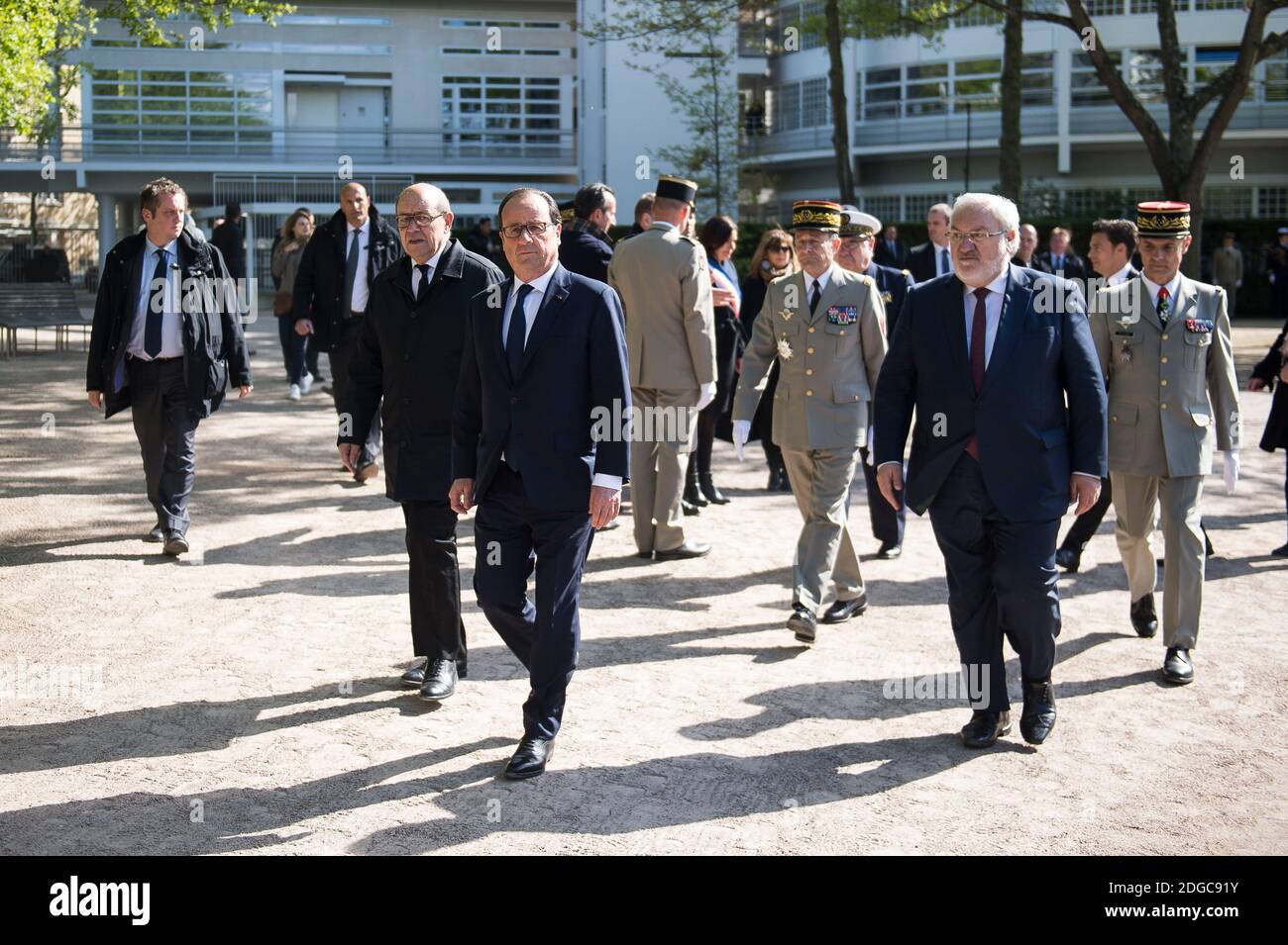 French President Francois Hollande with Minister of Defence Jean-Yves Le Drian and Secretary of State for Veterans and Remembrance Jean-Marc Todeschini, inaugurates a memorial in honor of French soldiers killed in foreign military operations (OPEX), at Parc Andre Citroen in Paris, France on April 18, 2017. Photo by Eliot Blondet/ABACARESS.COM Stock Photo