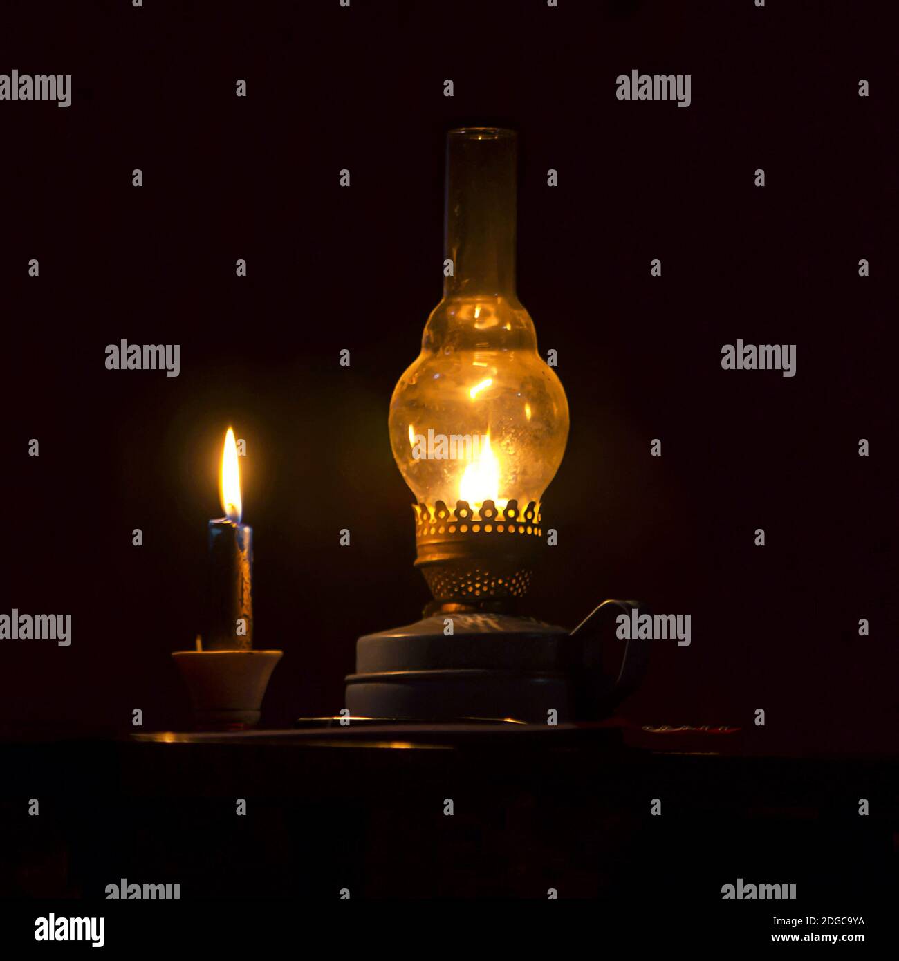 Kerosene lamp and a candle Stock Photo Alamy