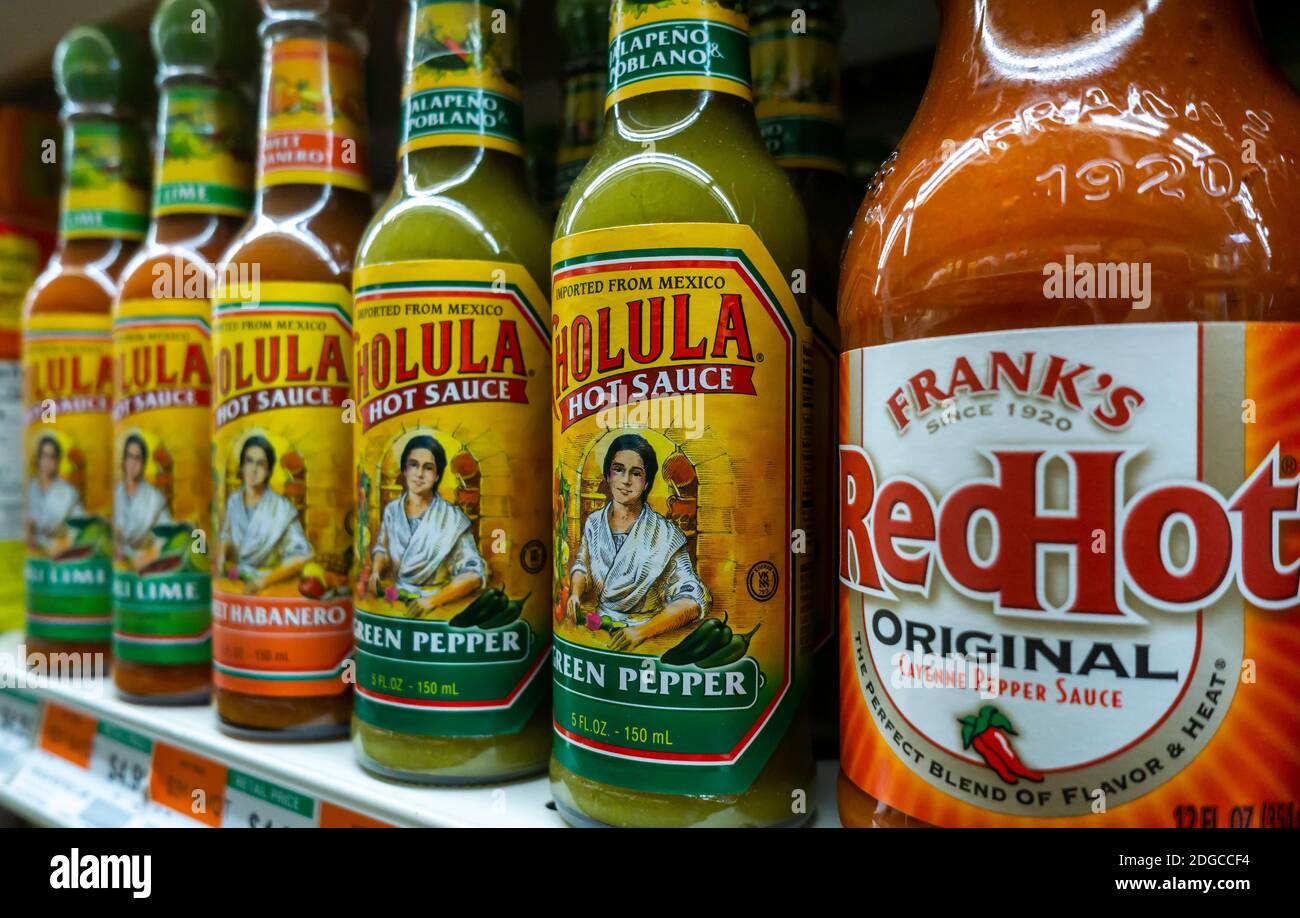 Bottles of Cholula brand hot sauce on supermarket shelves in New York