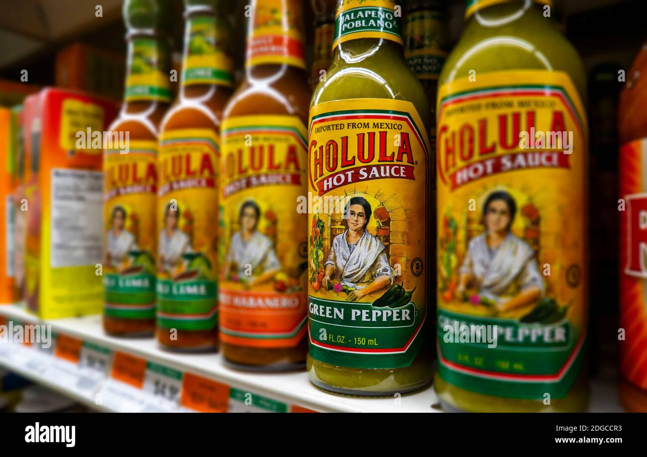 Bottles of Cholula brand hot sauce on supermarket shelves in New York