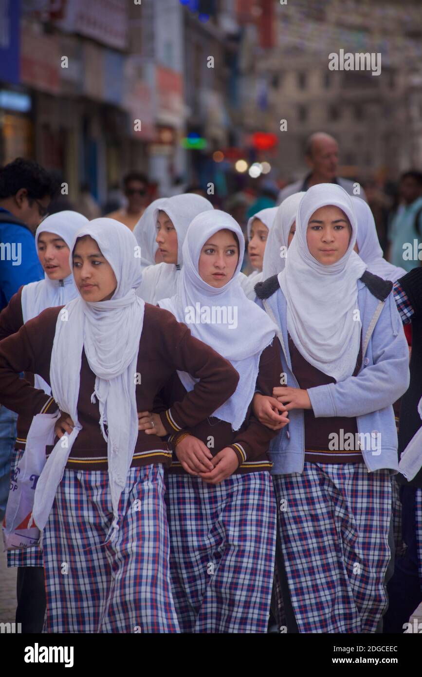Group of friendly muslim girls wearing headcloths in Leh street ...