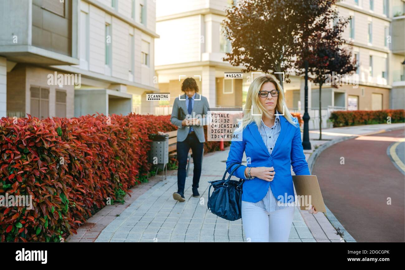 People detected by facial recognition while walking down the street Stock Photo