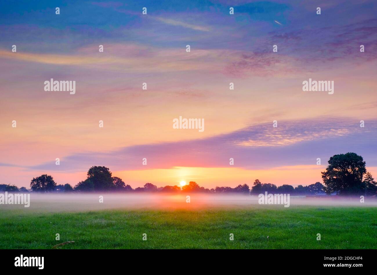 Colorful glowing sunrise Stock Photo - Alamy