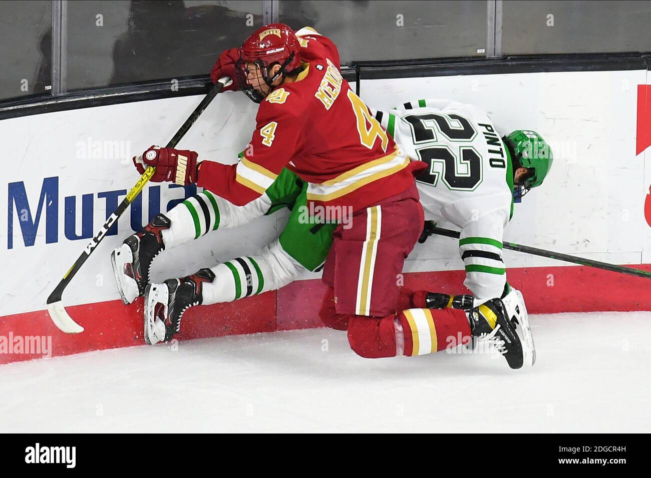 December 8, 2020 Denver Pioneers defenseman Griffin Mendel (4) checks
