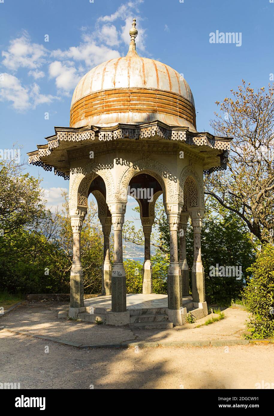 Open graceful stone gazebo pavilion with carved walls and a round roof- Yalta Crimea Stock Photo