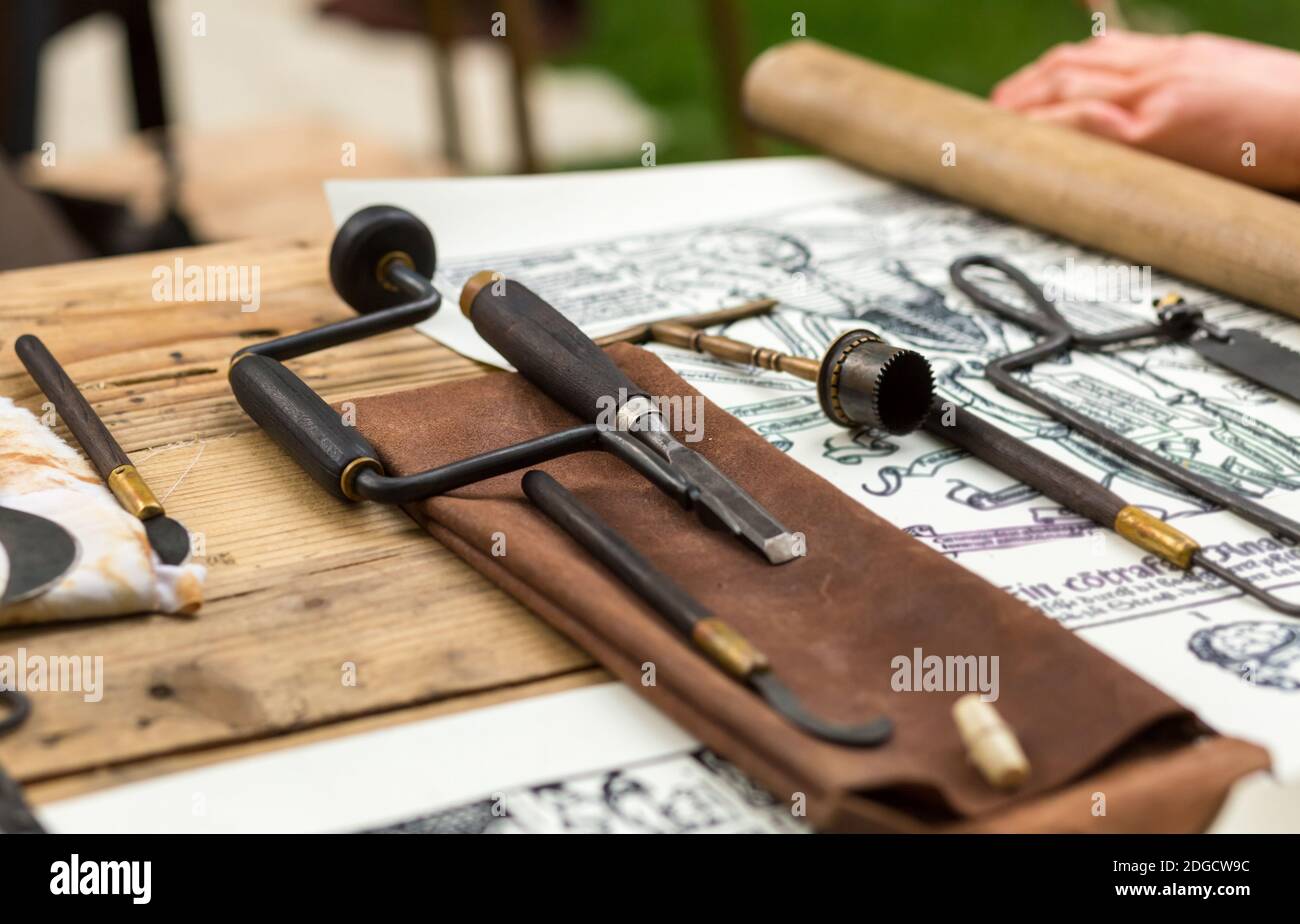 Medieval medical instruments for performing a surgical operation close-up Stock Photo