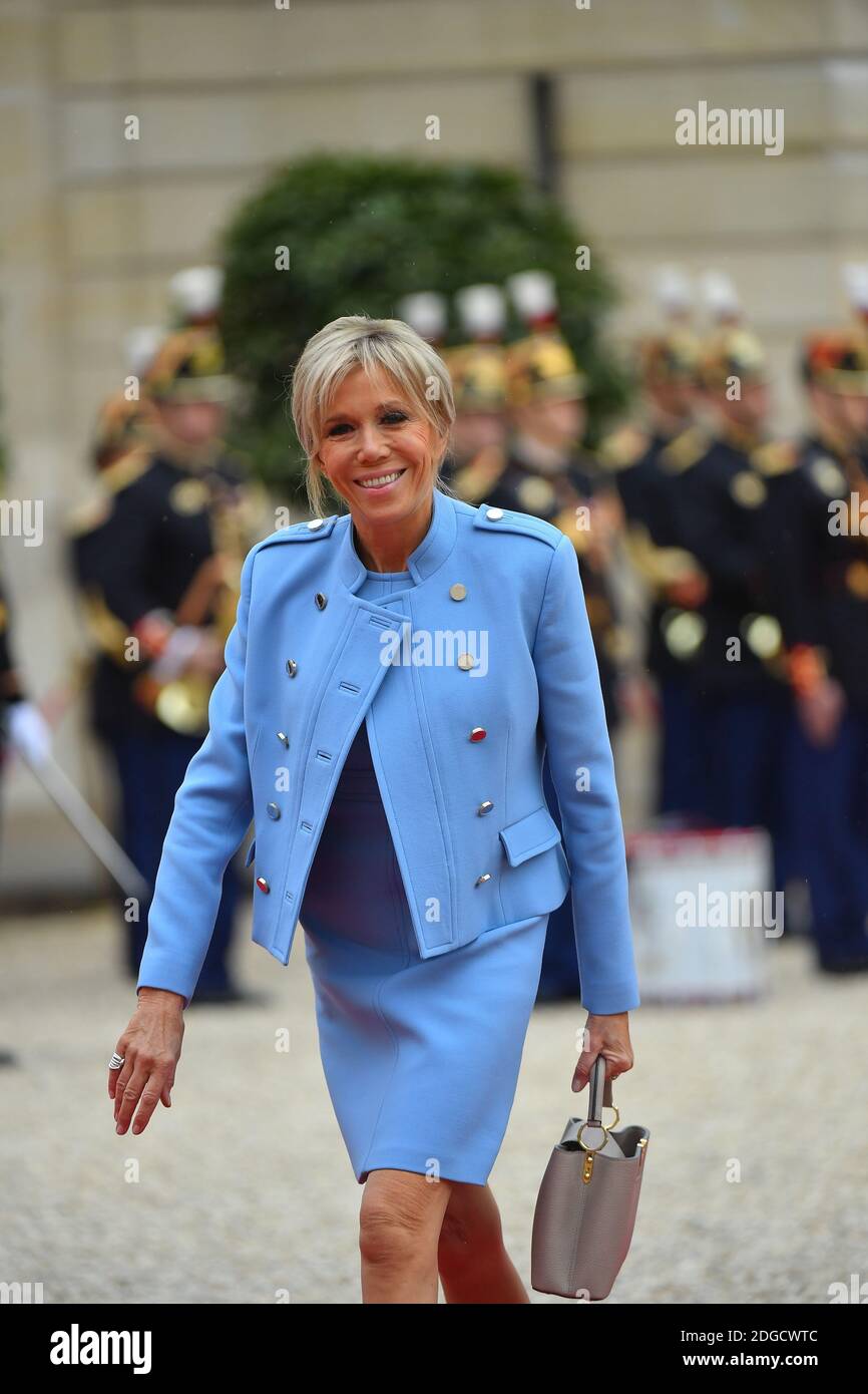 New First Lady Brigitte Macron arriving when New French President Emmanuel  Macron is installed in Elysee Palace, Paris, France on May 14th, 2017. She  wears a lavender blue dress by French designer
