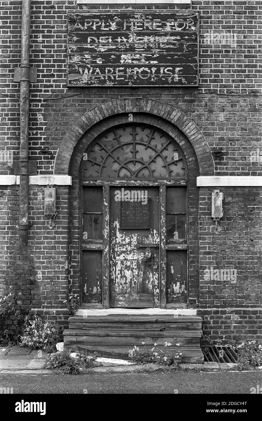 UK, London, Docklands, Isle of Dogs, early 1974. Warehouse door, West India Docks (north). This area is now home to The Museum of Docklands & various restaurants at Hertsmere Road, E14 4AL Stock Photo