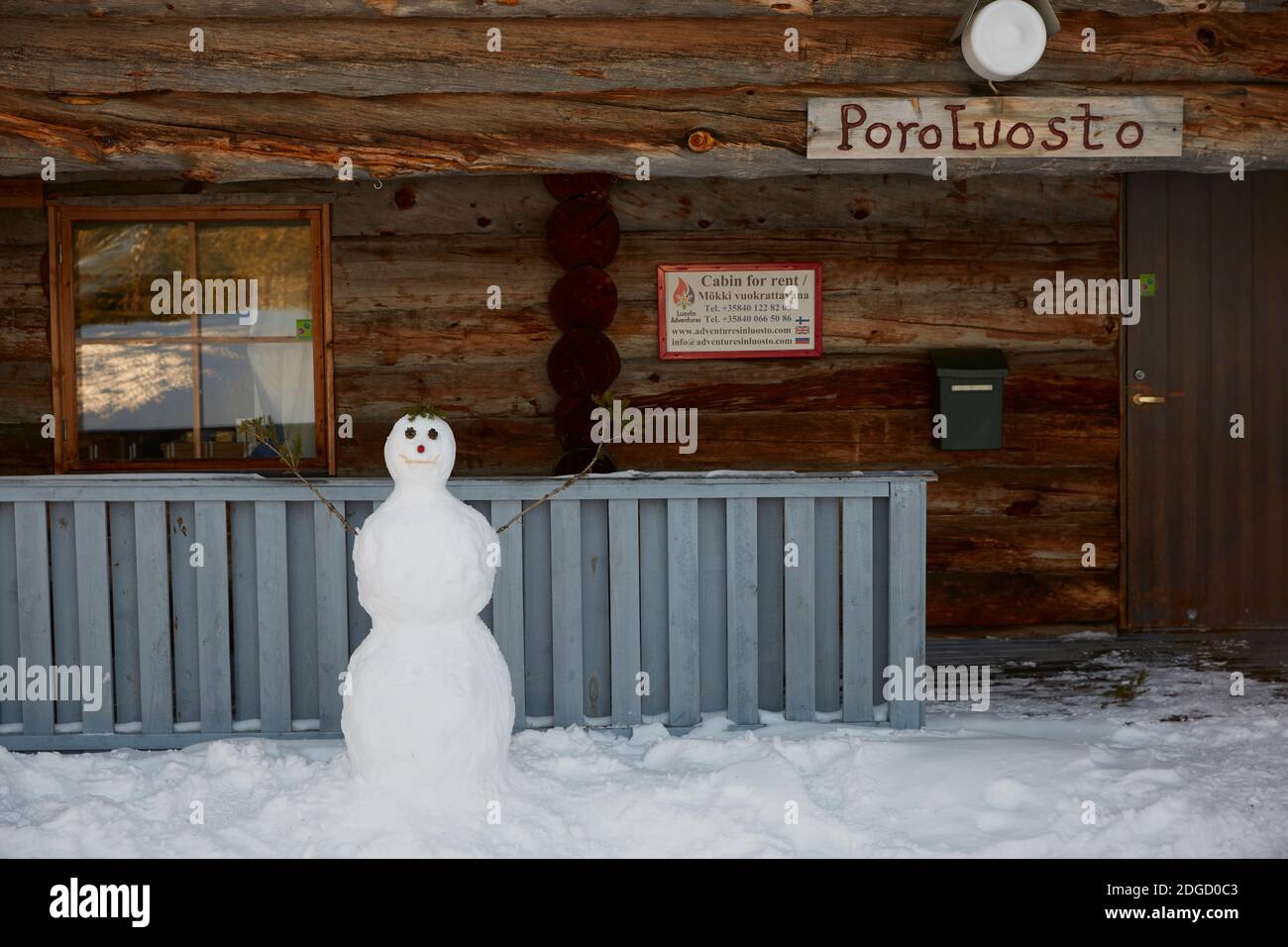 Snowy Log Cabin in the Sun in Lapland Stock Photo - Alamy