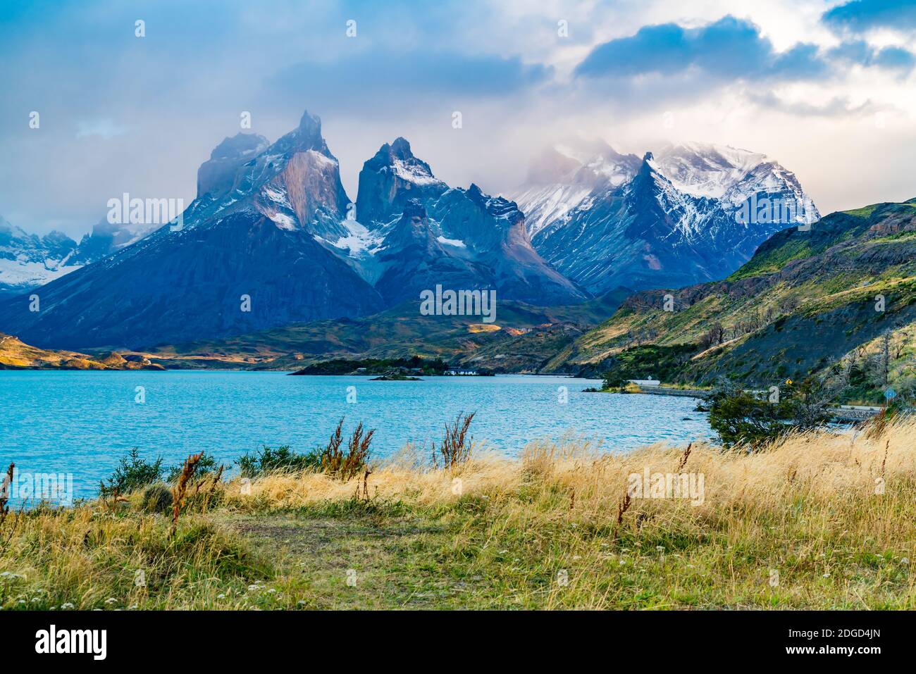 Beautiful foggy Cuernos del Paine Mountain in the evening Stock Photo