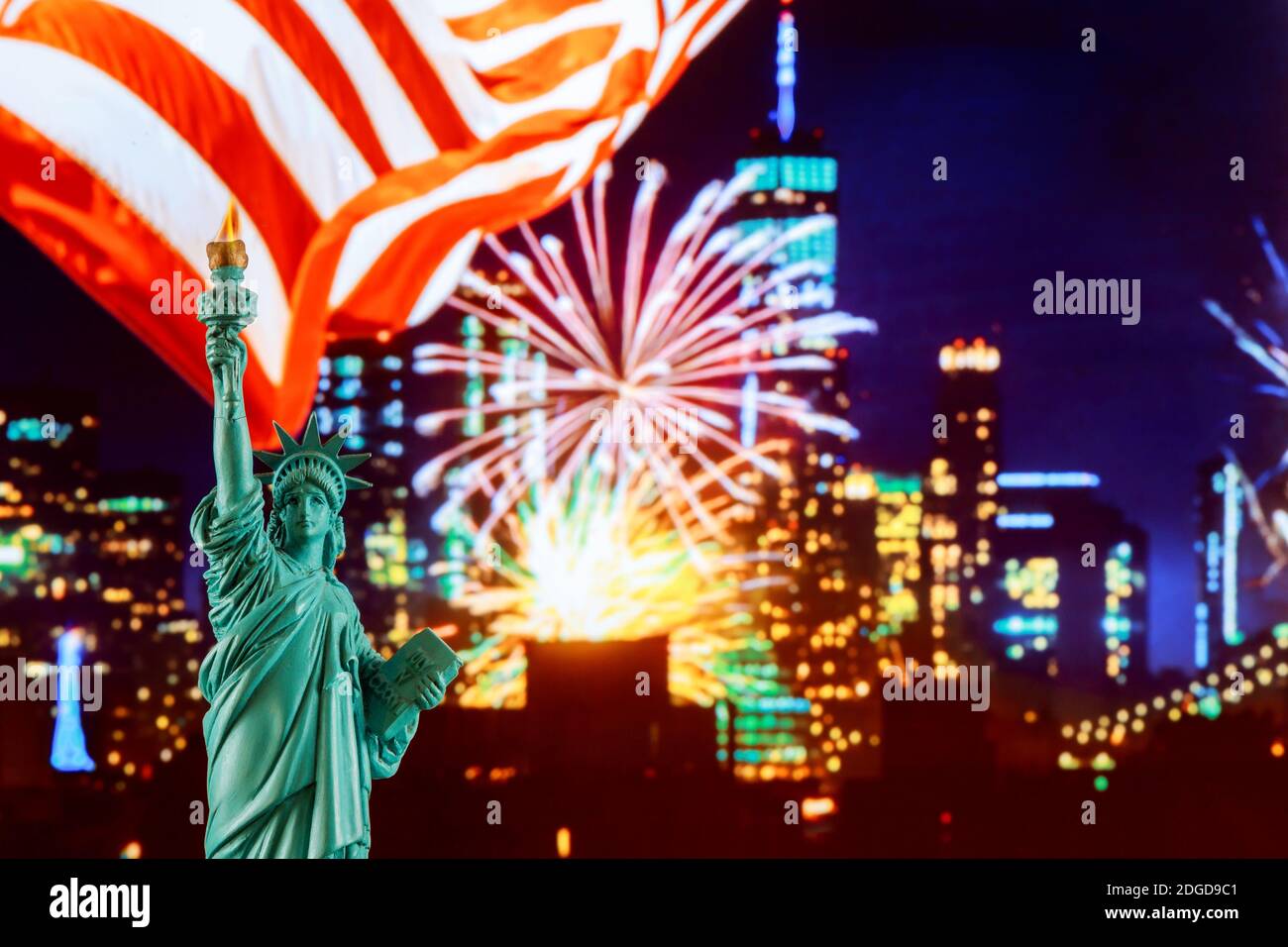 Spectacular view of Manhattan by night with Liberty Statue Stock Photo