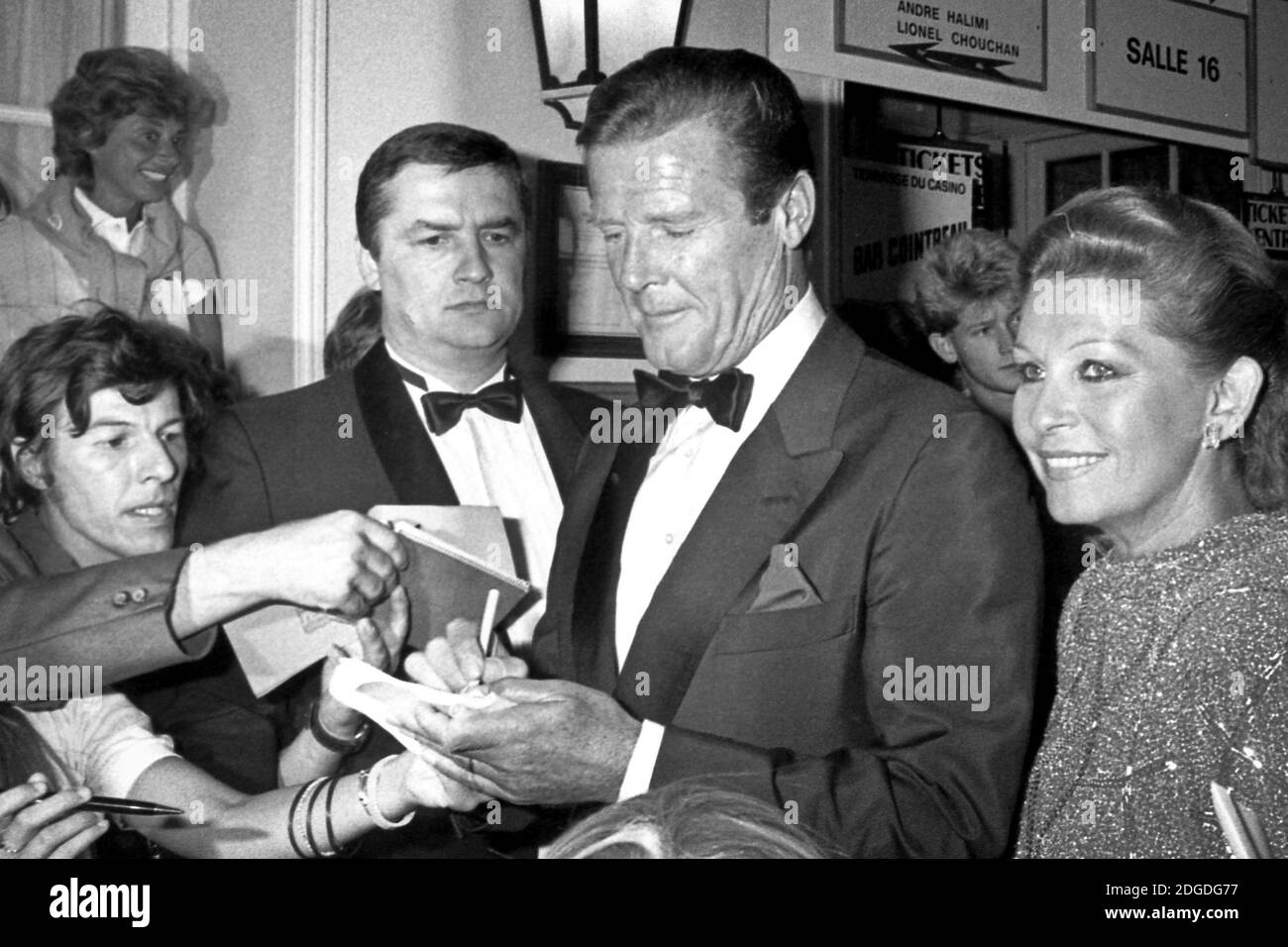 File - Roger Moore promotes his movie 'James Bond Dangereusement Votre' in 1985 in France. Photo by APS-Medias/ABACAPRESS.COM Stock Photo