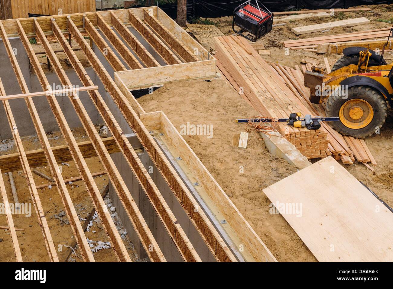 Construction showing massive solid wood joists construction forklift