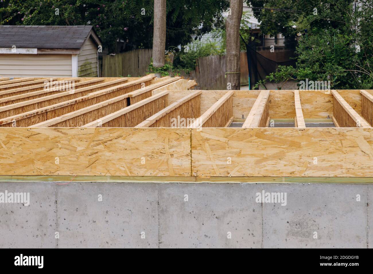 Installation of the construction showing joists trusses Stock Photo Alamy
